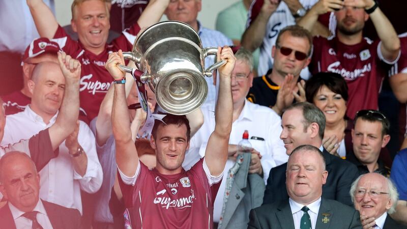 Galway’s David Burke lifts the Bob O’Keeffe Cup. Photograph: Ryan Byrne/Inpho