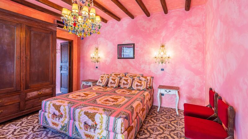 One of the seven bedrooms