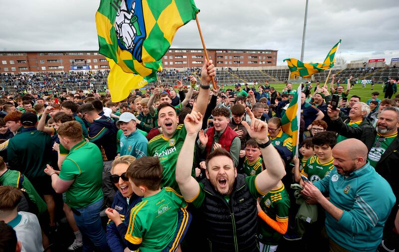 Meath fans celebrate after the game. Photograph: Ryan Byrne/Inpho