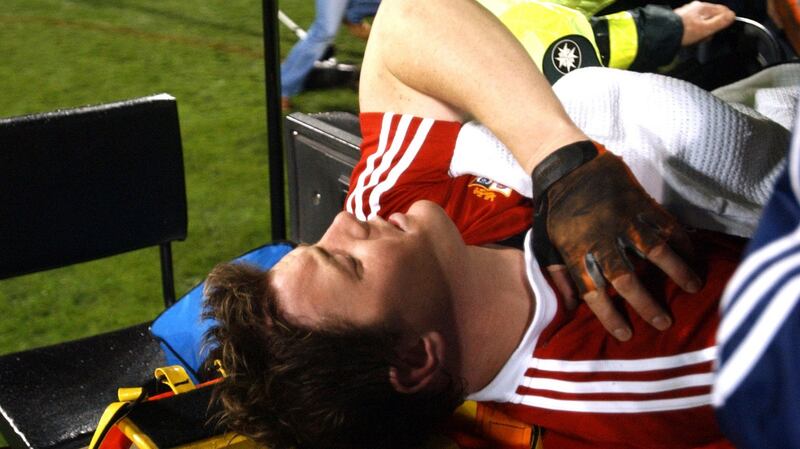 Lions captain Brian O’Driscoll leaves the field on a stretcher. Photograph:   Phil Walter/Getty Images