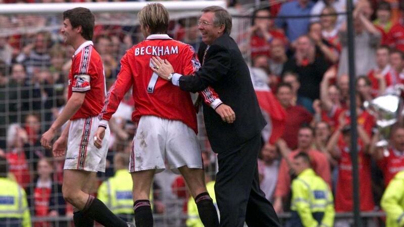 Manchester United manager Alex Ferguson (right) congratulates David Beckham (centre). Photograph: Phil Noble/PA Wire