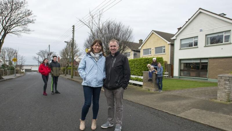 Geraldine De Brit: pictured on her street in Sutton with husband Donnacha McCarrick and children (from left) Jacqueline, Ronan, Grace and Denis. Photograph: Dave Meehan