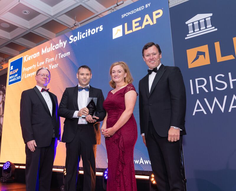 Richard Hammond, solicitor and partner at Hammond Good LLP and chair of the judging panel of the Leap Irish Law Awards; Kieran Mulcahy, principal at Kieran Mulcahy Solicitors; Michelle Daly, COO at Leap; and Anton Savage, MC of the night. Photograph: Paul Sherwood