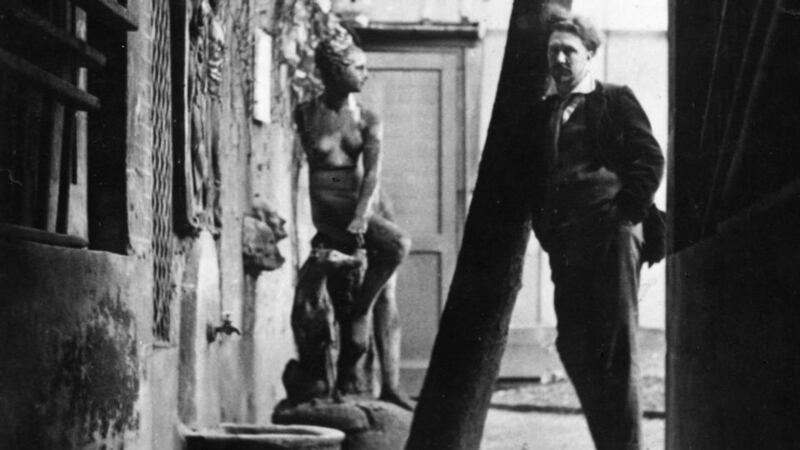 Ezra Pound in the garden outside his Paris studio  in the Latin Quarter of Paris.Photograph:  Topical Press Agency/Getty Images