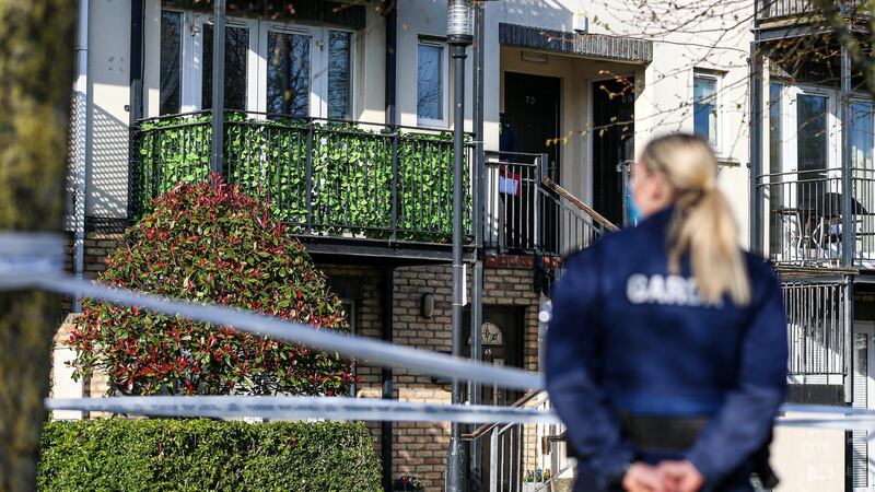 Gardaí at the scene of an assault in Finglas in which a young woman died. Photograph: Damien Storan