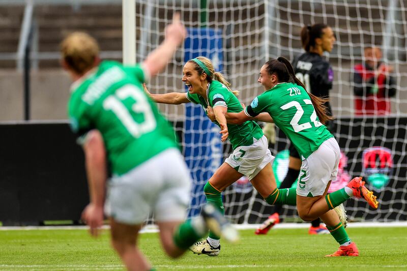 Julie-Ann Russell is congratulated by Jessica Ziu after scoring for the Republic of Ireland against France in last year's home Euro 2025 qualifier. Photograph: James Crombie/Inpho