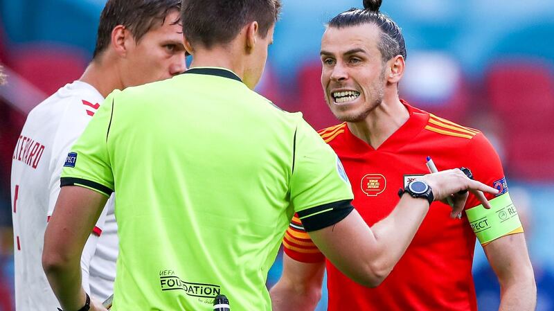 GAreth Bale remonstrates with referee Daniel Siebert during Wales’s defeat to Denmark in Amsterdam. Photograph:  PA