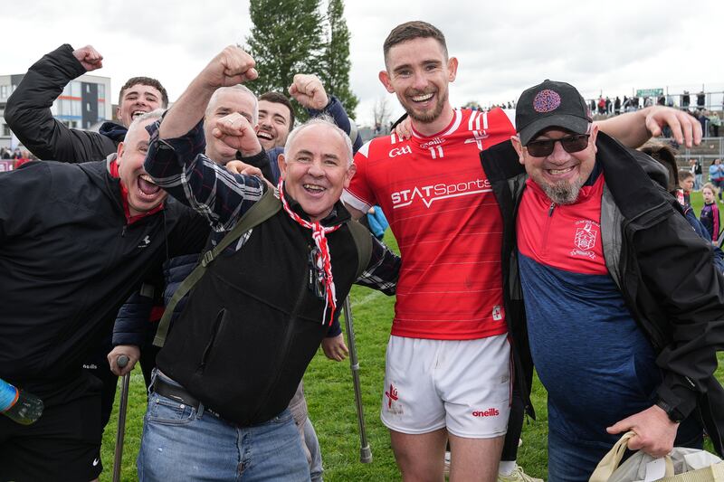 Ciarán Downey celebrates with Louth supporters after the Leinster SFC victory over Kildare in Tullamore. Photograph: James Lawlor/Inpho