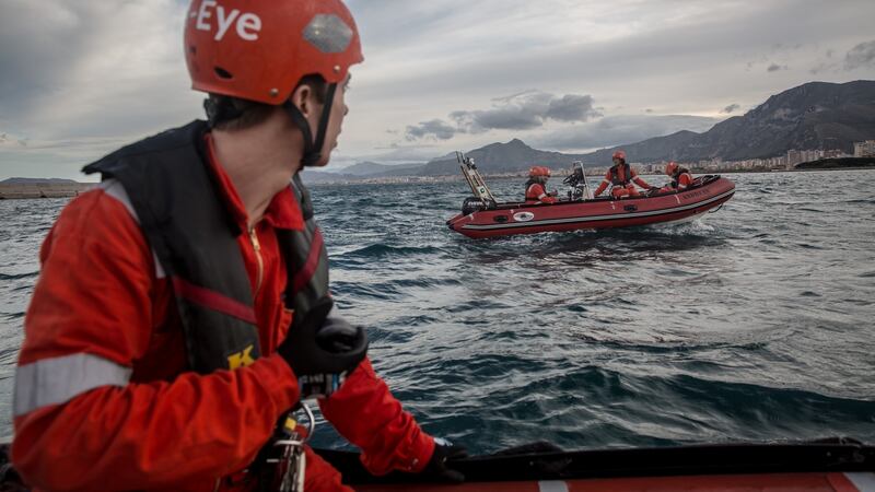 Volunteers on the Alan Kurdi rescue ship practice carrying out rescues in the port of Palermo, Sicily. Photograph: Sally Hayden