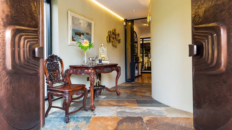 Copper doors and entrance hall