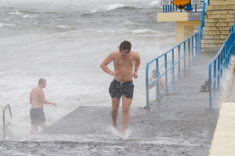 Storm Amy hit the west coast from early Friday afternoon, with swimmers braving the elements at the diving platform in Salthill, Galway. Photograph Nick Bradshaw 