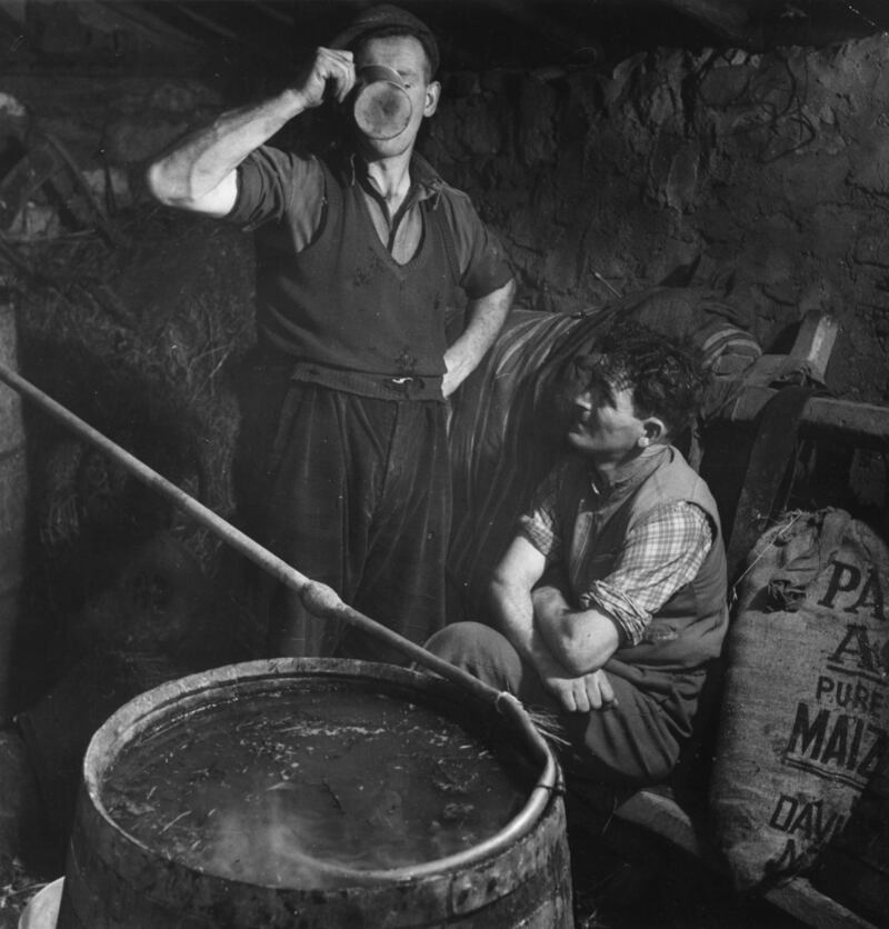 October 4th, 1952: A poteen maker tasting the fruits of his labour. Photo by John Chillingworth/Picture Post/Hulton Archive/Getty Images