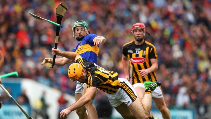 Cathal Barrett of Tipperary challenges Kilkenny’s Colin Fennelly during the All-Ireland hurling final at Croke Park. Photograph: Ryan Byrne/Inpho