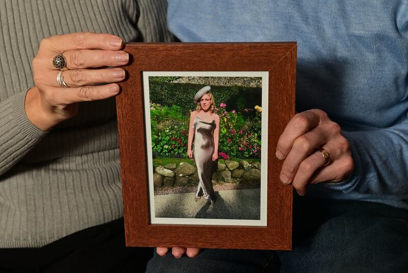 Natalie McNally’s parents, Noel and Bernadette, hold a photograph of their daughter. 'Every time my phone rings, I hope it’s the police to tell me they’ve caught somebody,' said Noel. Photograph: Colm Lenaghan/ Pacemaker for The Irish Times