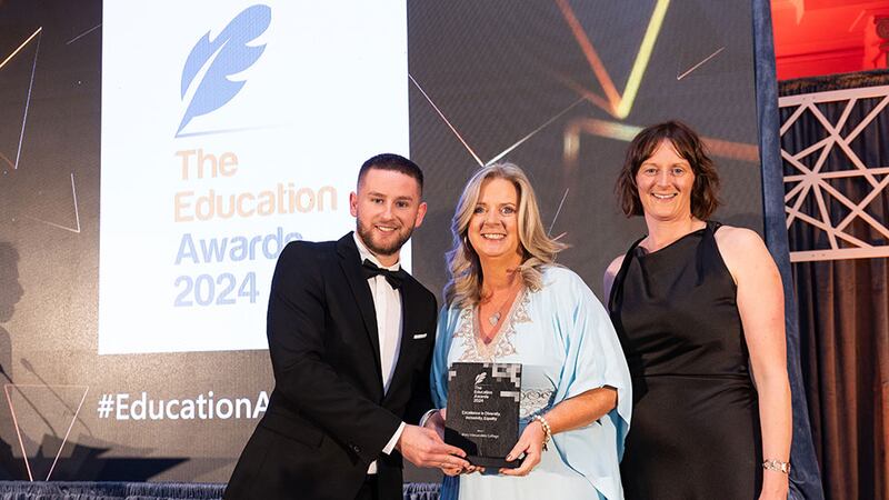 Adam Kane, community lead at Business River, presents the excellence in diversity, inclusivity, equality award to professor Lorraine McIIrath and Nicola Brennan, Mary Immaculate College