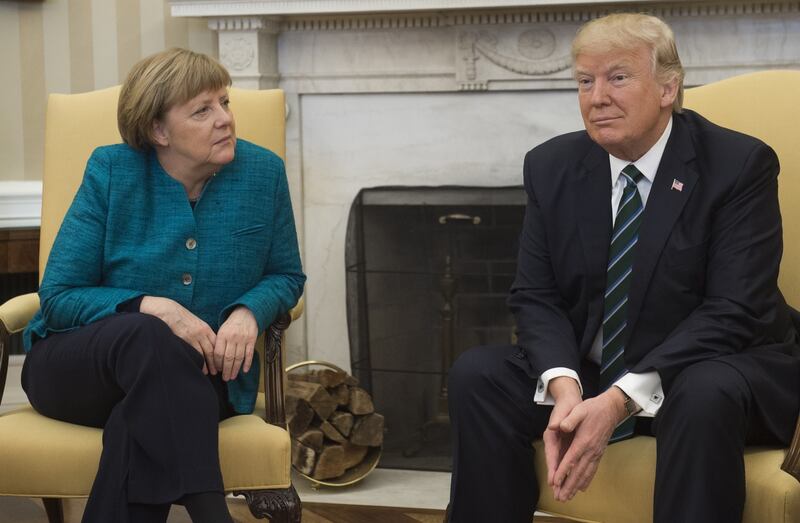 Bizarre snub: Angela Merkel with Donald Trump in the Oval Office in March 2017, when he refused to shake her hand. Photograph: Saul Loeb/AFP/Getty