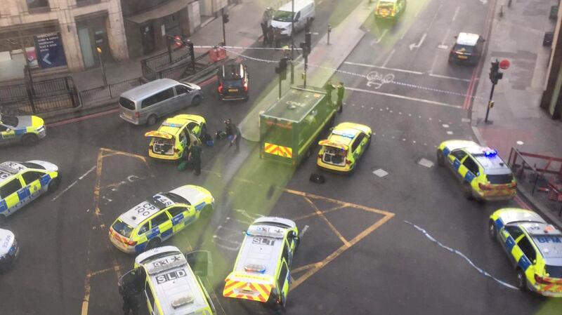 Police and emergency services arriving at Monument tube station following the attack at London Bridge. Photograph: Alexandru Ion/AFP.