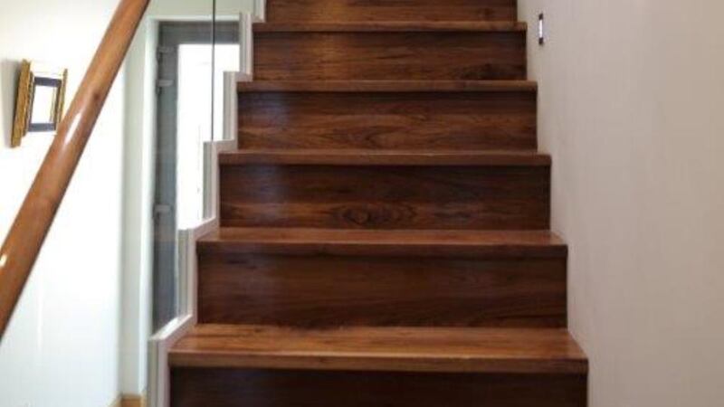 The staircase in the  house  is lit by a lancet window