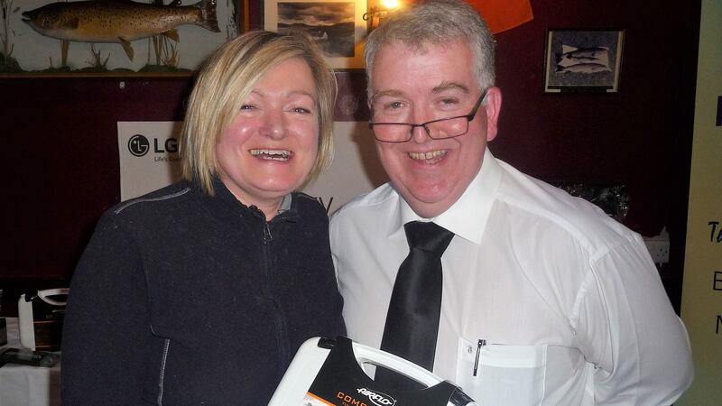 Anne McWilliams, winner of ladies section with two trout, with Tomás Burke
