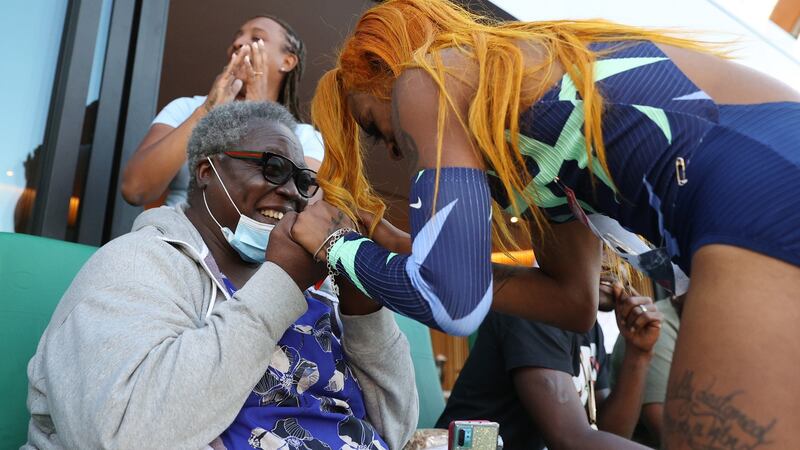 Richardson celebrates winning the women’s 100 meter final with her grandmother at the US Olympic trials. Photo: Patrick Smith/Getty Images