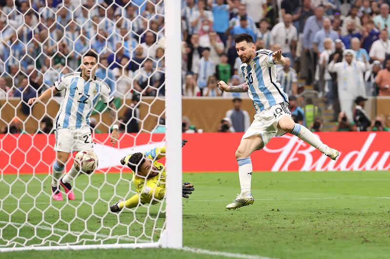 Argentina's Lionel Messi scores the team's third goal past Hugo Lloris of France in extra time. Again it's jubilation for Argentina, until France equalise yet again through a Mbappé penalty. The game finishes 3-3 after extra time. Photograph: Julian Finney/Getty