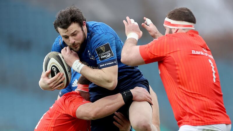 Munster’s CJ Stander and James Cronin tackle Robbie Henshaw of Leinster during the Guinness Pro 14 Final at the  RDS. Photograph: James Crombie/Inpho