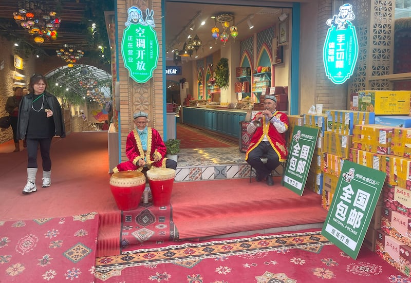 Traders at the Grand Bazaar, Urumqi. Photograph: Denis Staunton