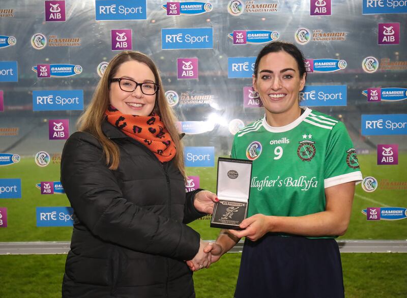 Sarsfields’ Niamh McGrath is presented with the player of the match award. Photograph: Evan Treacy/Inpho 