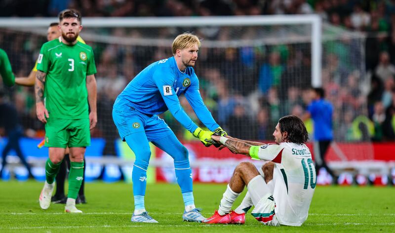 Republic of Ireland goalkeeper Caoimhin Kelleher (right) with Dominik Szoboszlai of Hungary after the Fifa World Cup qualifier Group F match at Aviva Stadium, Dublin, in September.  Photograph: Laszlo Geczo/Inpho  