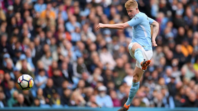 Kevin De Bruyne scores Manchester City’s third goal during the Premier League match against Swansea City at Etihad Stadium. Photograph: Laurence Griffiths/Getty Images