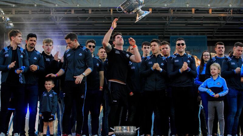 Michael Darragh McAuley with Dublin teammates during homecoming celebrations in Merrion Square, Dublin. Photograph: Gareth Chaney/Collins