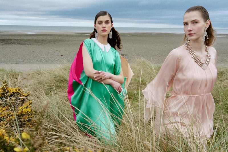 Multicoloured kaftan and peach kaftan dresses, both by Joanna Kielucka at Marion Cuddy