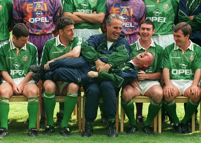 Mick McCarthy with bagman Charlie O'Leary and the Republic of Ireland team in 1996. Photograph: Billy Stickland/Inpho