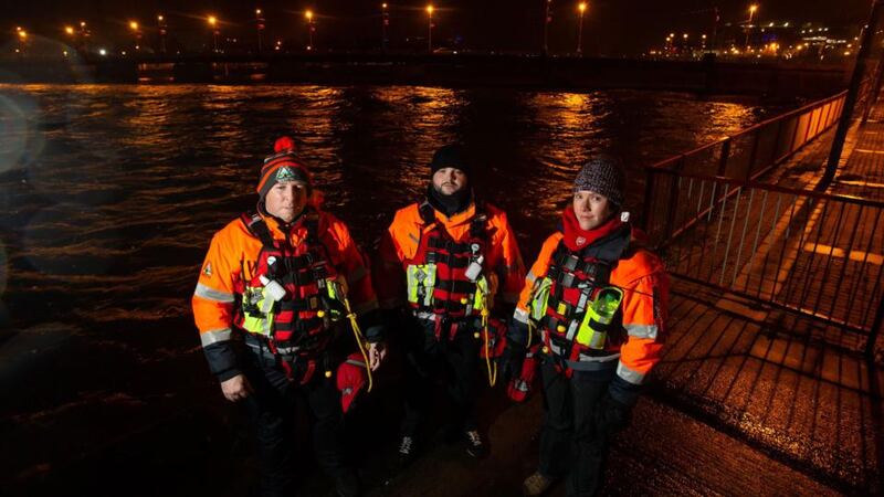 On patrol with Limerick Suicide Watch, Jason Begley, Sean Lyons and Ciara McInerney on Steamboat Quay, Limerick. Photograph:  Alan Place