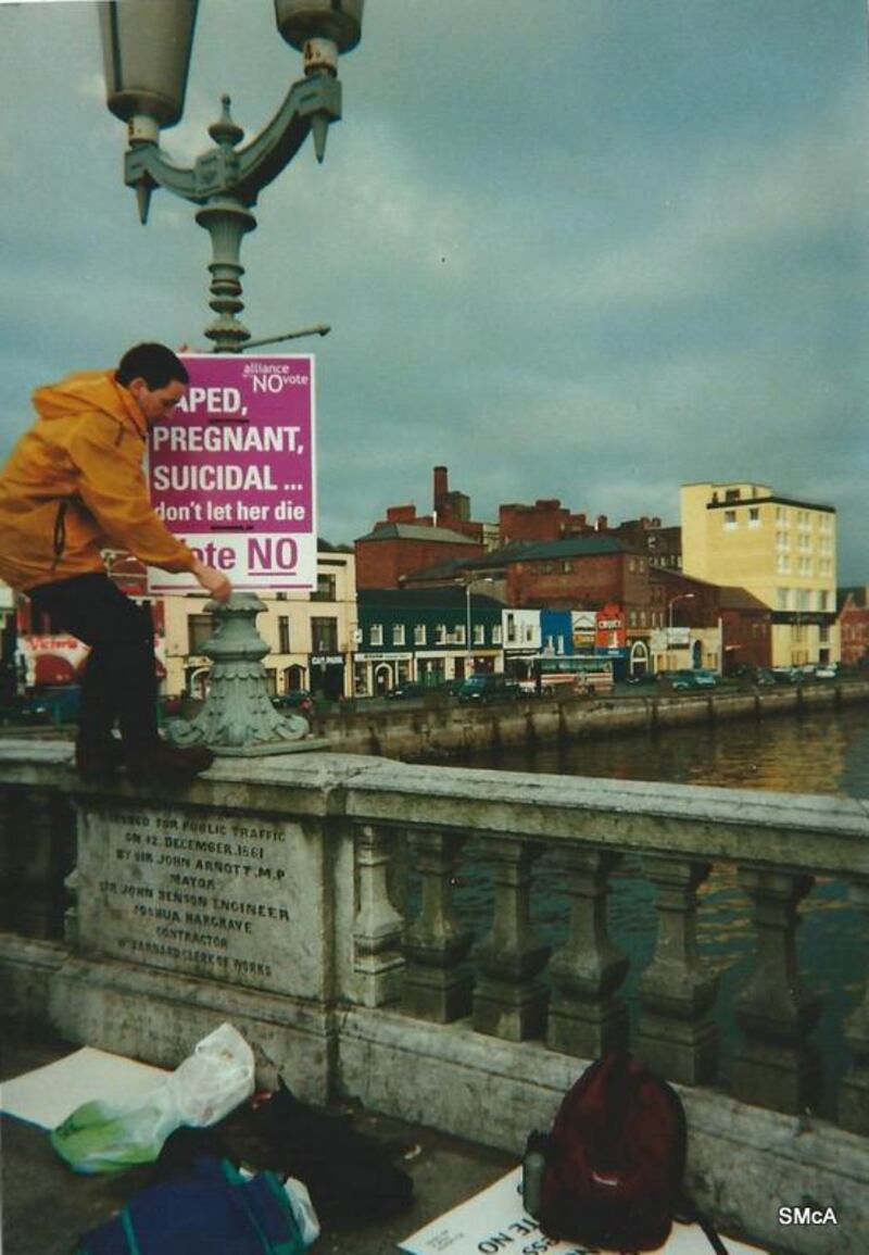 Fintan Lane postering Patrick’s Bridge, Cork in 2002. Photograph: Sandra McAvoy