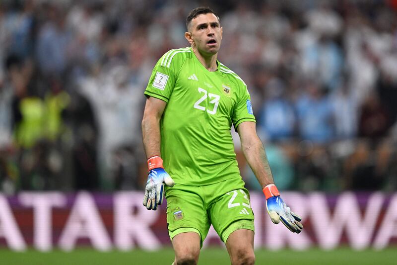 Argentina's goalkeeper Emiliano Martinez celebrates with a dance after saving the penalty of French forward Kingsley Coman. Martinez was the hero of the shoot-out for Argentina, using mind games to put off his opponents. Photograph: Kirill Kudryavtsev/AFP via Getty