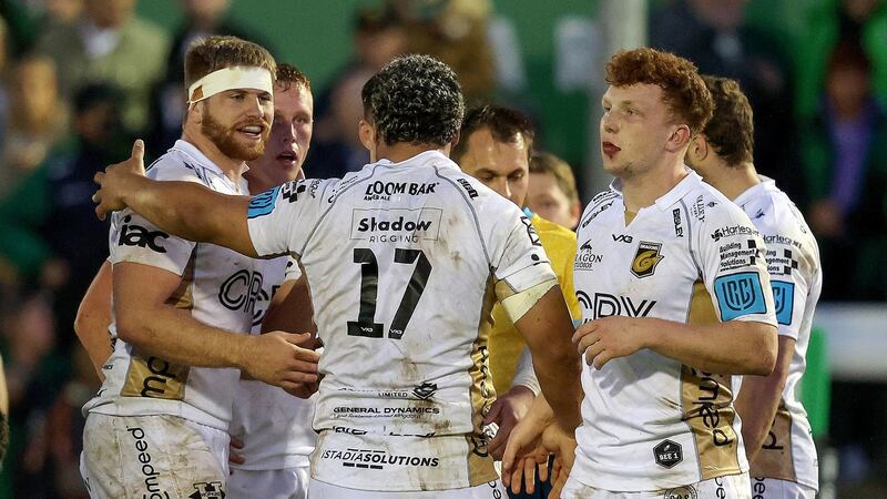 Dragons players celebrate after defeating Connacht in Galway. Photograph: Bryan Keane/Inpho