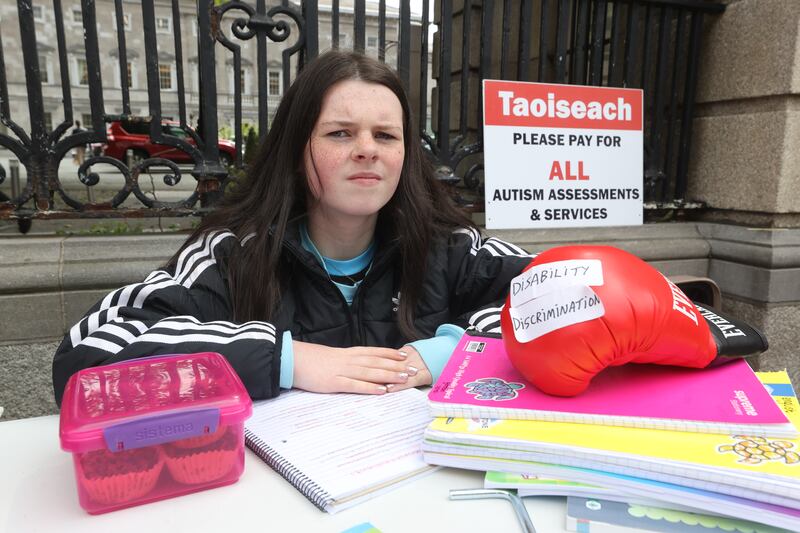 Cara Darmody, who has two brothers with autism, campaigns outside Leinster House. Photograph: Liam McBurney/PA Wire