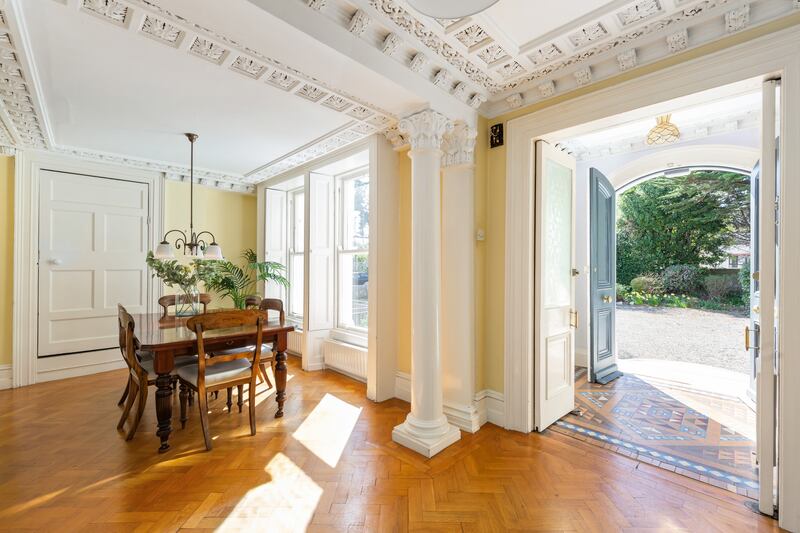 Diningroom sits just inside the front porch