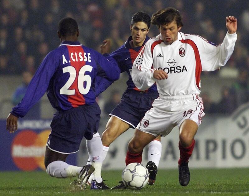 Mikel Arteta in action for PSG against AC Milan in 2001. Photograph: Olivier Morin/AFP/Getty Images