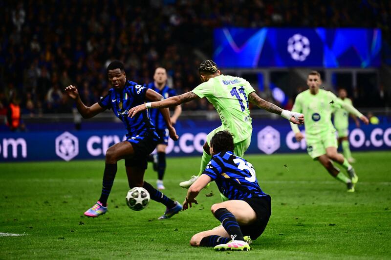 Barcelona's Brazilian forward Raphinha scores his team's third goal for an 87th-minute lead. Photograph: Marco Bertorello/ Getty