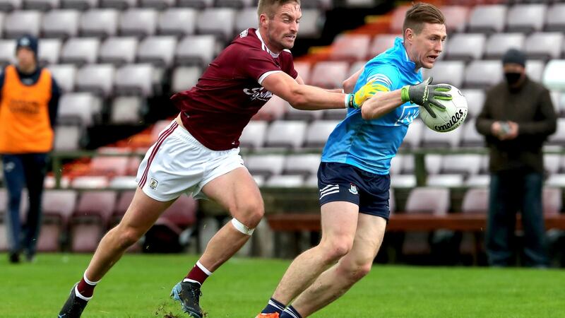 Galway’s Gary O’Donnell challenges Dublin’s John Small at Pearse Stadium. Photograph: Byran Keane/Inpho
