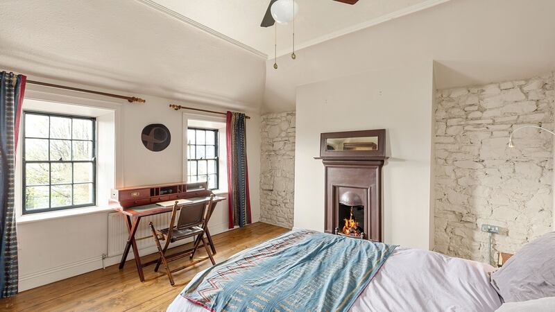 The bedrooms have exposed stone walls  and original timber floorboards