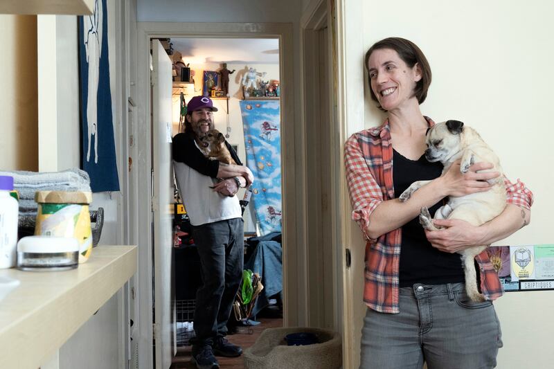 Geoffrey Glass and Laura Perna in their separate bedrooms at home in Texas. Photograph: Brandon Thibodeaux/New York Times