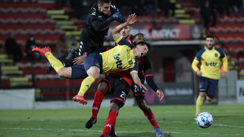 Royale Union Saint-Gilloise Union’s Dante Vanzeir is challenged by RFC Seraing goalkeeper Timothy Galje  and Gael Kakudji during the 4-0 win for Union in the Jupiler Pro League game at Stade du Pairay on Tuesday night. Photograph:  Virginie Lefour/Belga Mag/AFP via Getty Images
