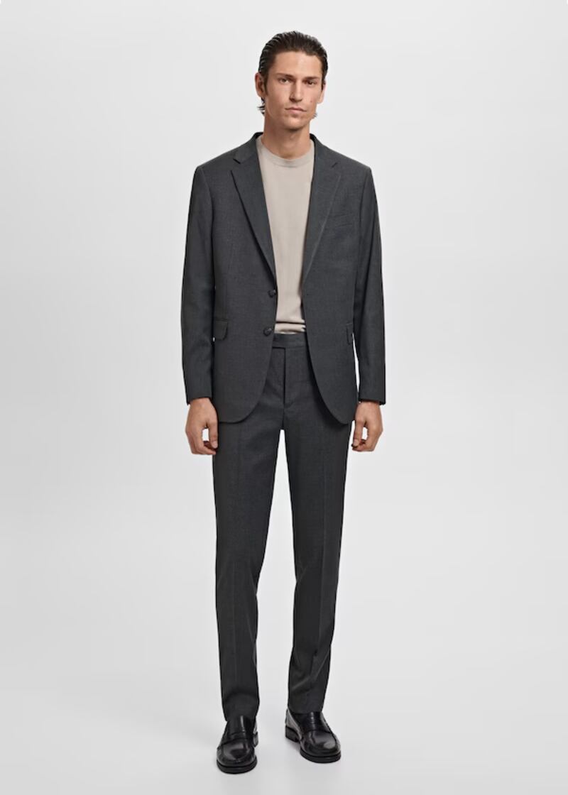 Charcoal jacket, €129, and matching trousers, €59, with beige jumper, €39, from Mango menswear