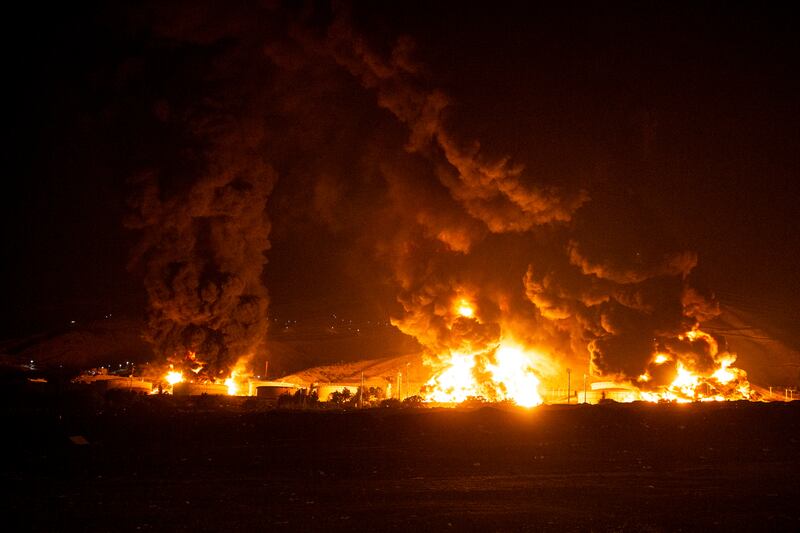 An oil storage facility on fire after Israeli air strikes on Tehran, Iran. Photograph: Arash Khamooshi/New York Times
