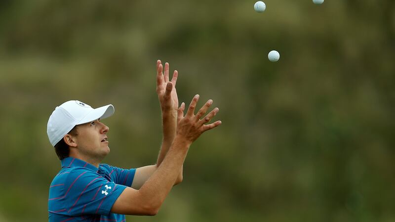 Jordan Spieth catches golf balls during a practice round prior to the Open Championship at Royal Birkdale. Photograph: Paul Childs/Reuters
