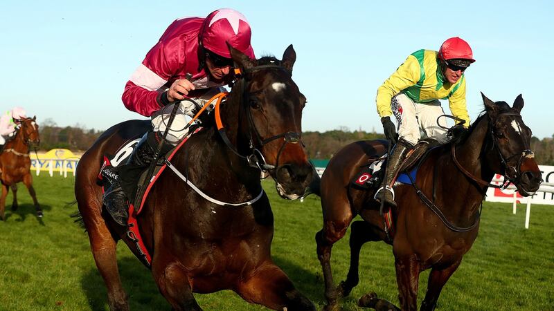 Davy Russell on board Apple’s Jade overtakes Robbie Power on Supasundae. Photograph: James Crombie/Inpho