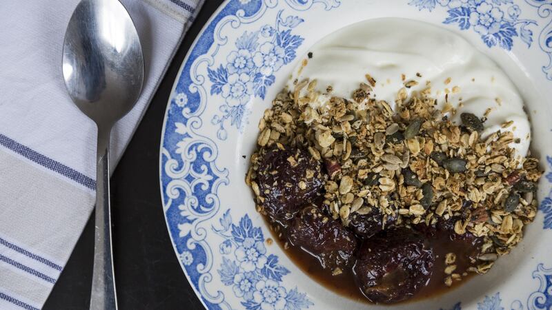 Prunes with orange and cardamom. Photograph: Emma Jervis Photography